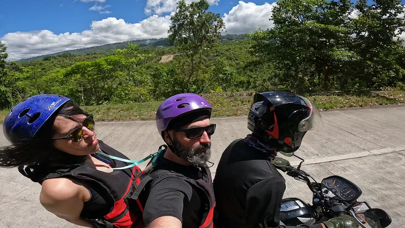 Take a motorcycle to get to Kawasan Falls