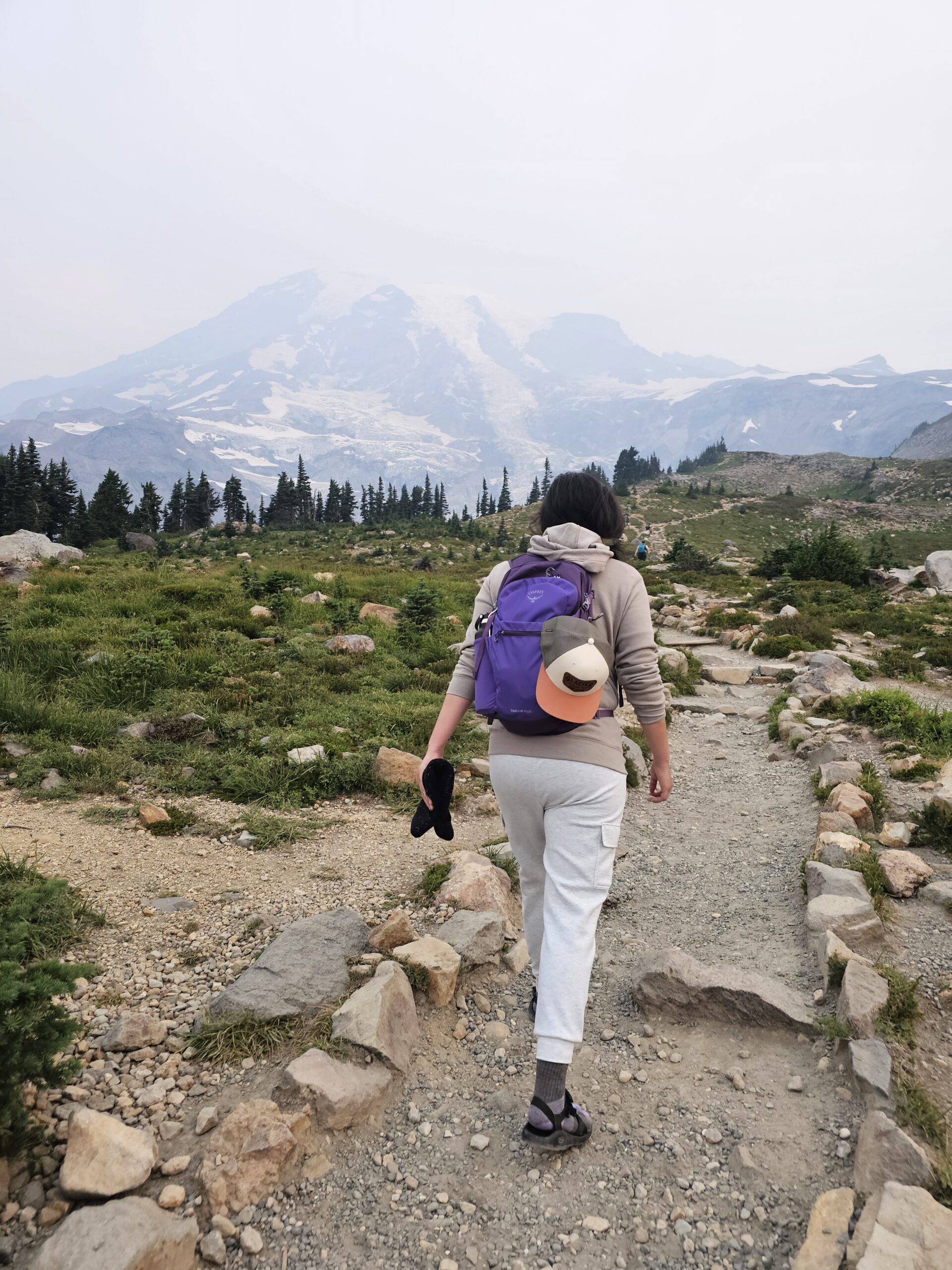 Walking along the path at Sky Loop Trail at Mount Ranier National Park