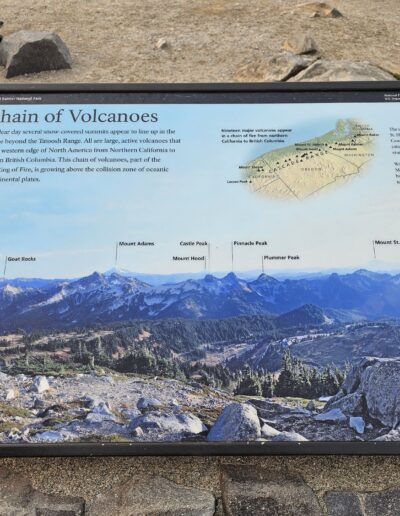 An information sign at a rest area along the path at Mount Ranier Sky Loop Trail